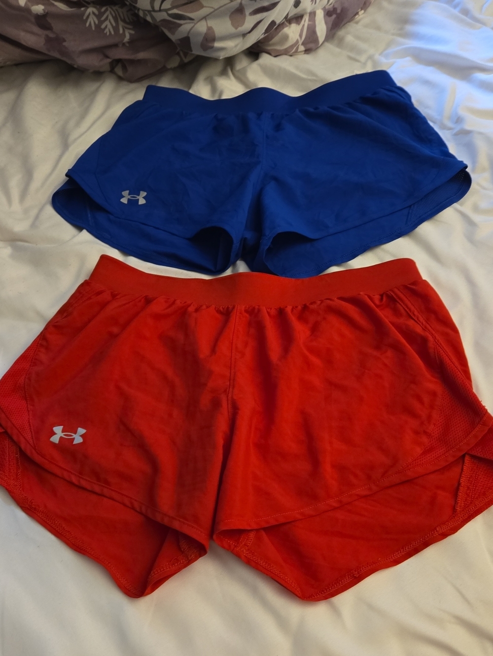 Under Armour Women's Athletic Shorts in Royal Blue and Bright Red